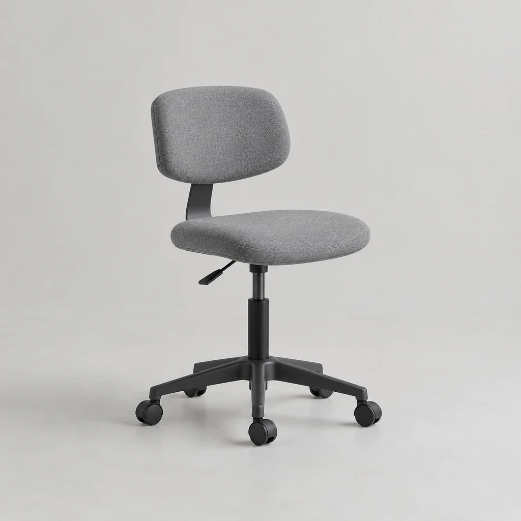 Compact armless task chair with grey fabric seat on castors