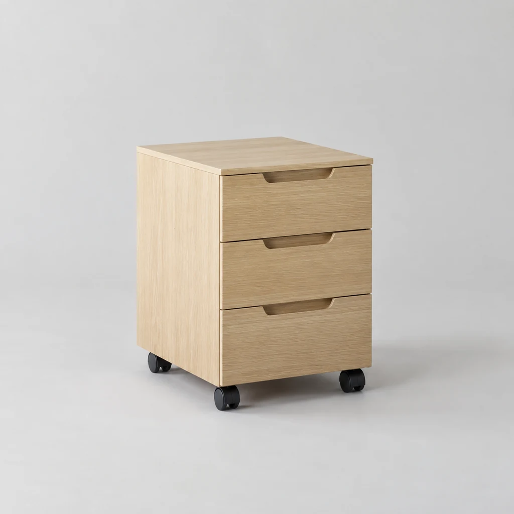Three-drawer under-desk pedestal in pale oak on castors